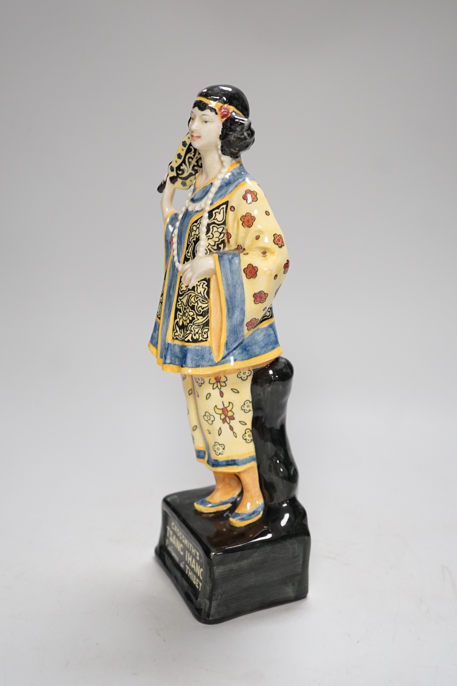 A Royal Doulton advertising figure 'Grossmith’s Tsang Ihang perfume of Tibet', 30cm high